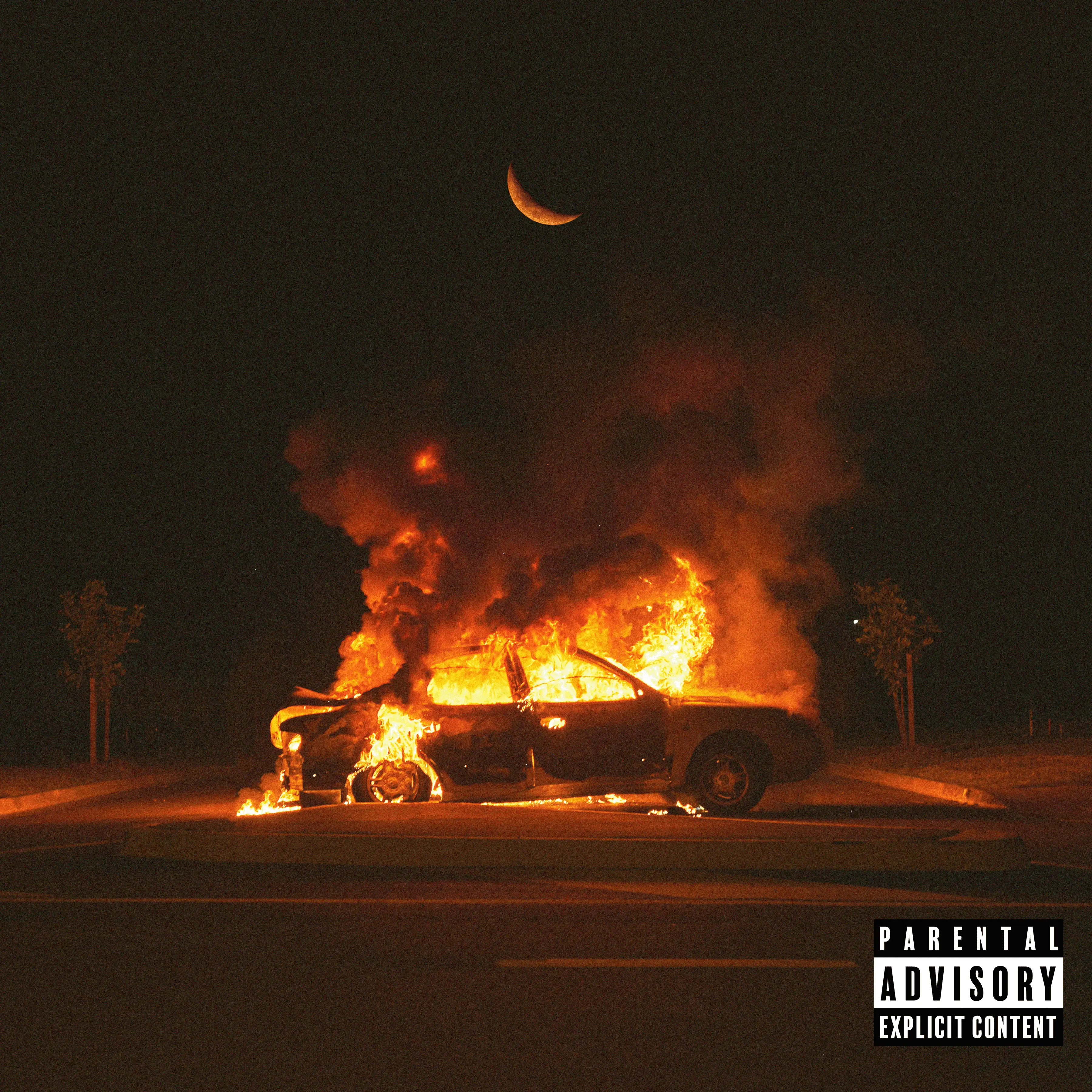 Artwork for The Modes' single, Crashin'. The picture shows a car in flames on a road with trees, at night with a moon in the background. The artwork includes a parental advisory explicit content warning.